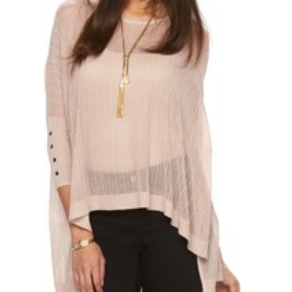 Jennifer Lopez open stitch crewneck sweater